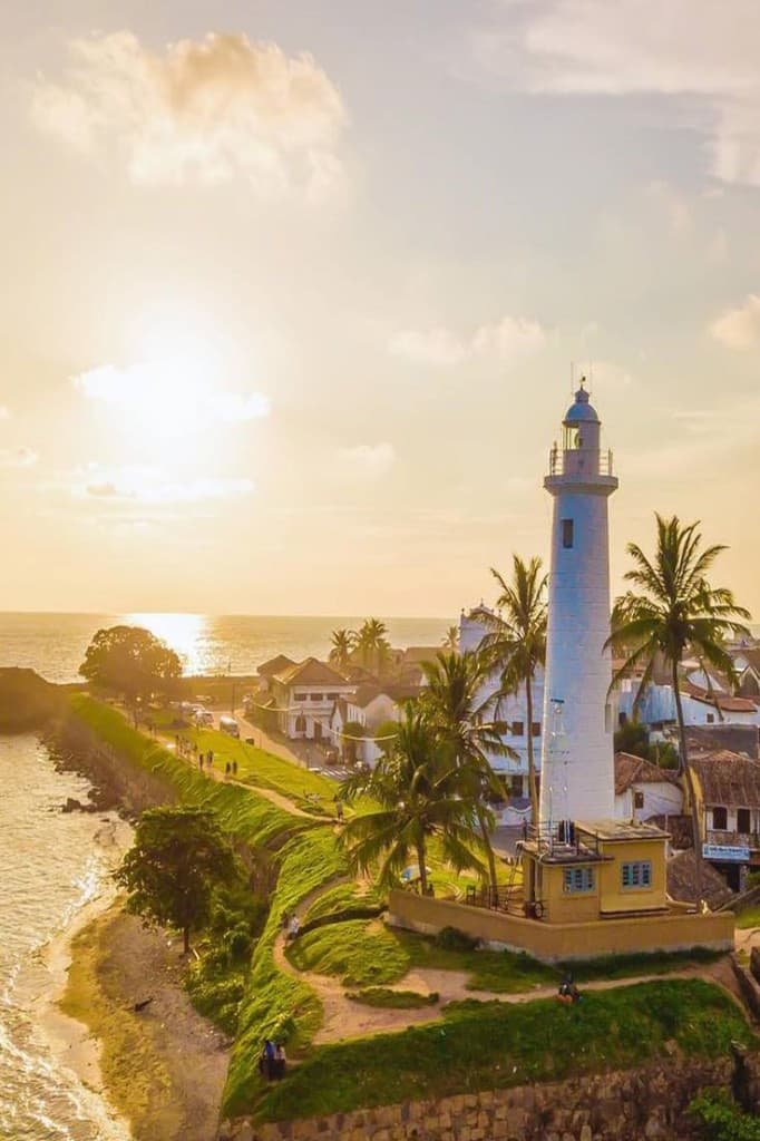 Galle Fort lighthouse at golden hour on the southern coast