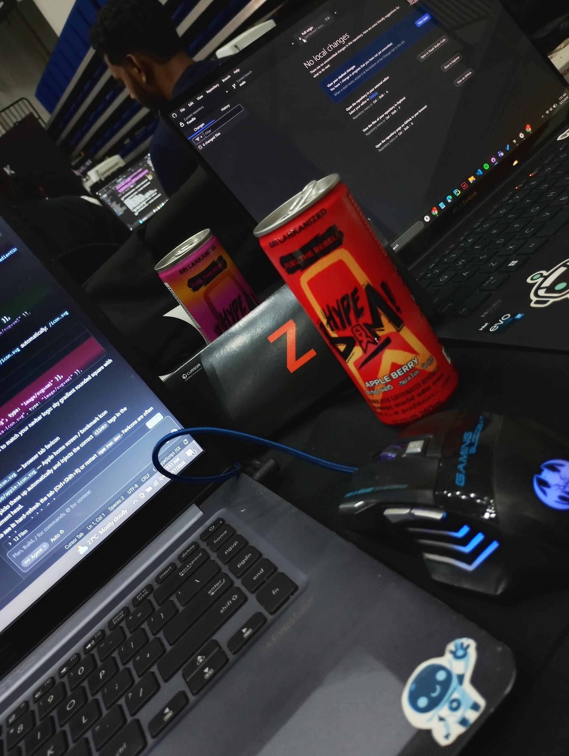 Late-night Buildathon workspace with Cursor open, GitHub Desktop, and Hype energy drinks