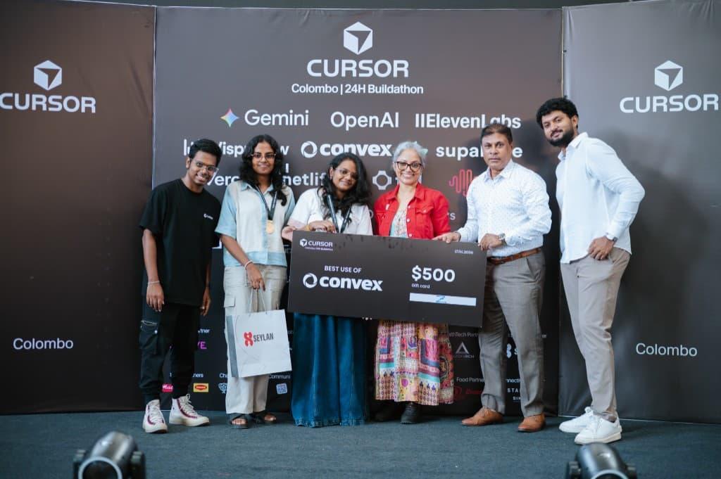 Team Z on stage holding the Best Use of Convex prize board at the Cursor Colombo 24-Hour Buildathon